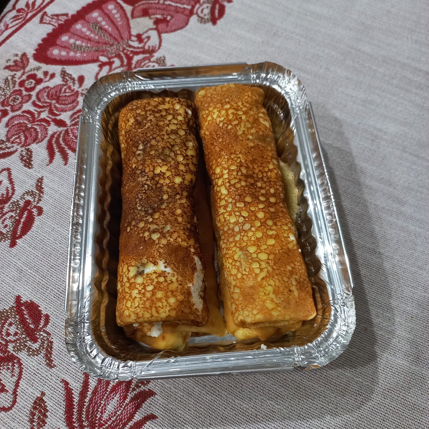 Crepes with sweet cottage cheese and raisins